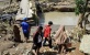 Korban Banjir Rayakan Tahun Baru Dengan Doa Bersama  