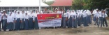 Puluhan Personel Brimob Polda Sulteng Datangi Sekolah. Ini yang Mereka Lakukan