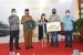 Pjs Wali kota Batam Serahkan Hadiah Utama Undian Bank Riau Kepri