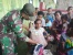 TNI Bagikan Perlengkapan Sekolah dan Pakaian Layak Pakai di Perbatasan RI-PNG