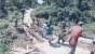 Babinsa Koramil 1709-02/Yapen Timur Ikut Gotong Royong Bantu Masyarakat Perbaikan Jembatan 