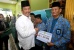 Serahkan Insentif dan Seragam Baru, Rudi Berharap PMB Terus Kompak 